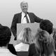 Motivational speaker Ron Kalbee, pictured above in better times at one of his hugely popular <I>Go For It!</I> seminars, recently added a new word to his vocabulary following a string of personal and professional disasters.